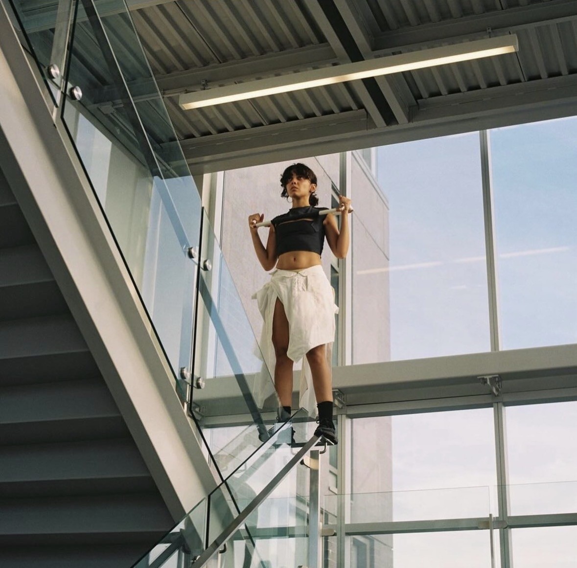 Parastoo Amanzadeh performing on a staircase at Nuit Blanche